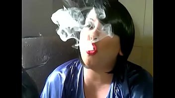 Chubby Mistress In Gloves Indulges In Her Smoking Fetish